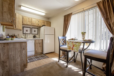 Kitchen and dining area at Comanche Wells Apartments in Albuquerque NM October 2020